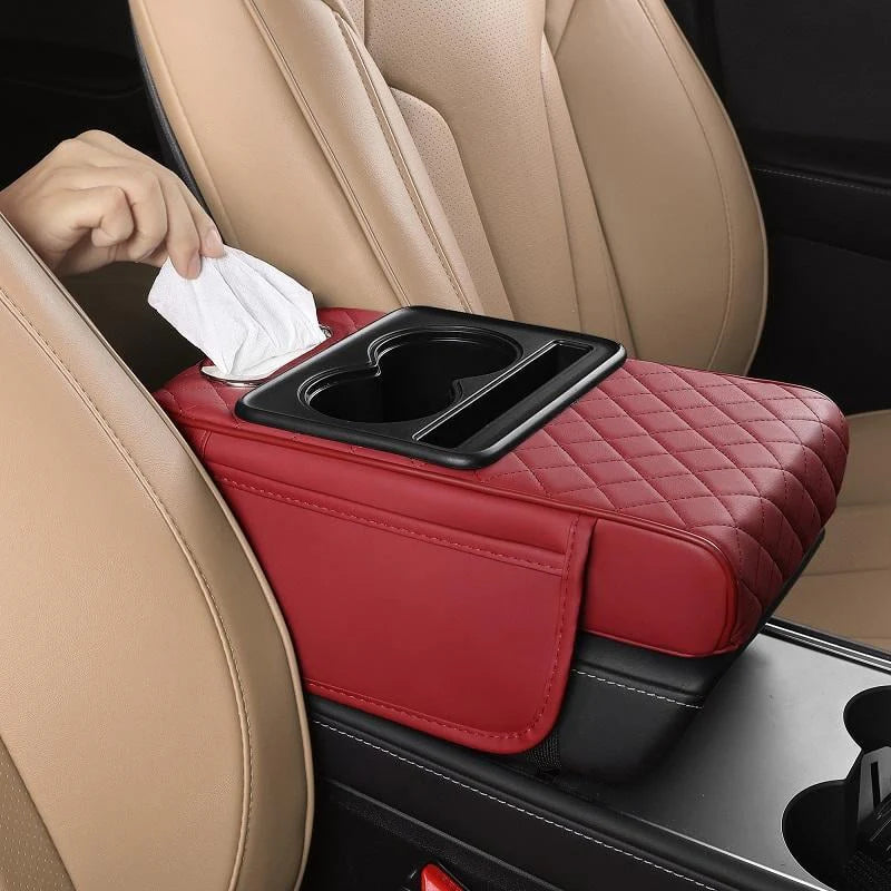 Red leather car armrest console with built-in cup holders and tissue box